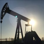 Oil settles higher in volatile 1