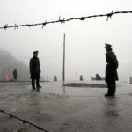 Chinese soldiers guard Nathu La mountain pass, between Tibet and northeastern Indian state of Sikkim